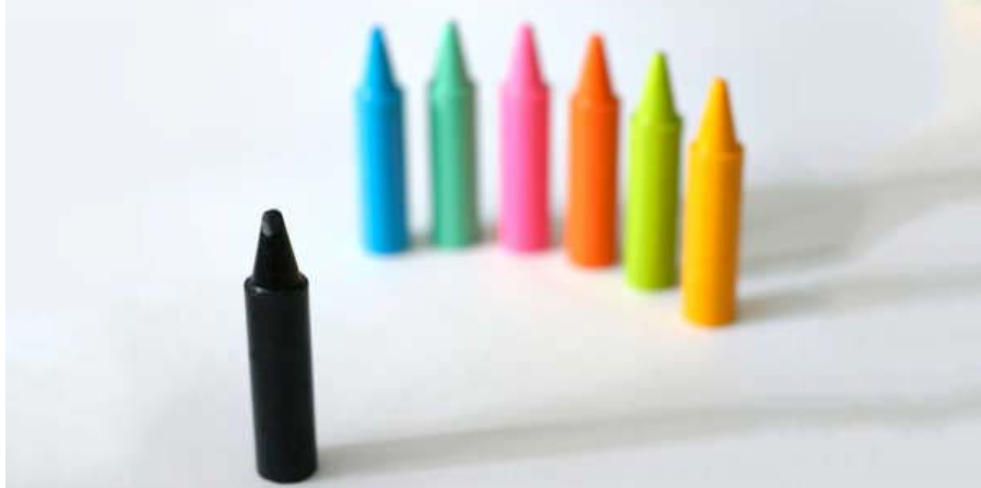7 crayons depicting cultural differences