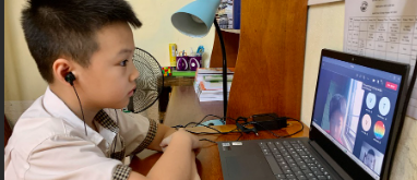 Vietnamese student on computer